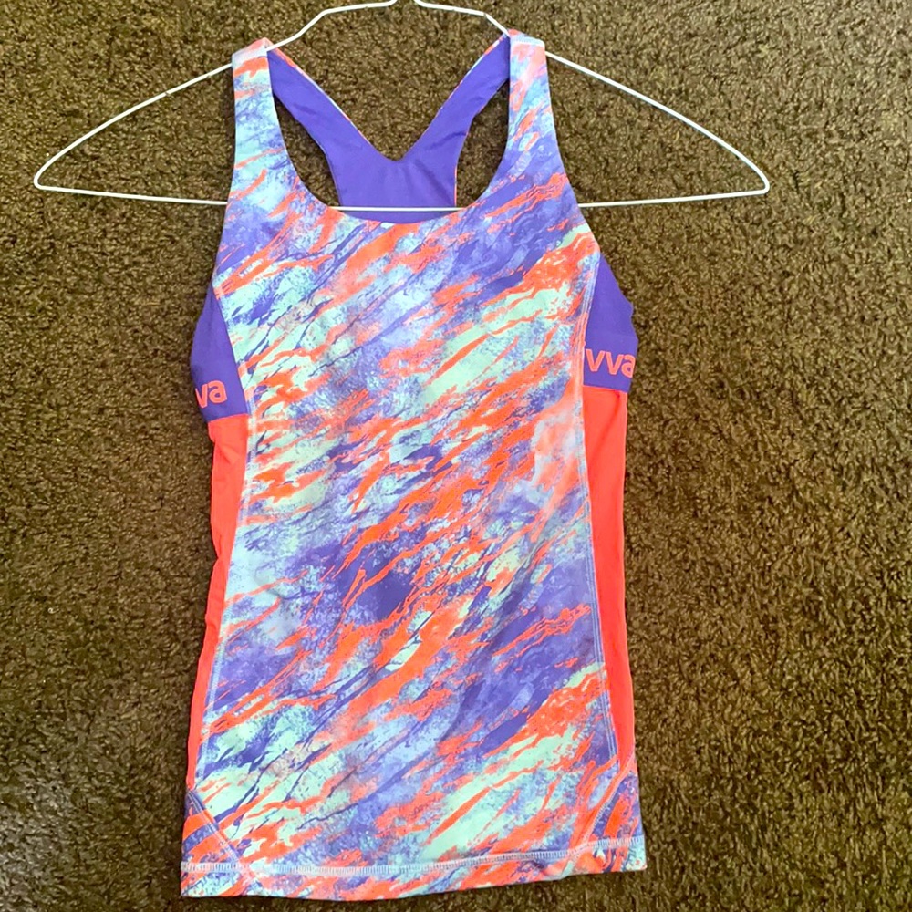 Girls sports tank from Ivivva with built in bra.